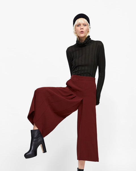 Double-breasted faux fur coat